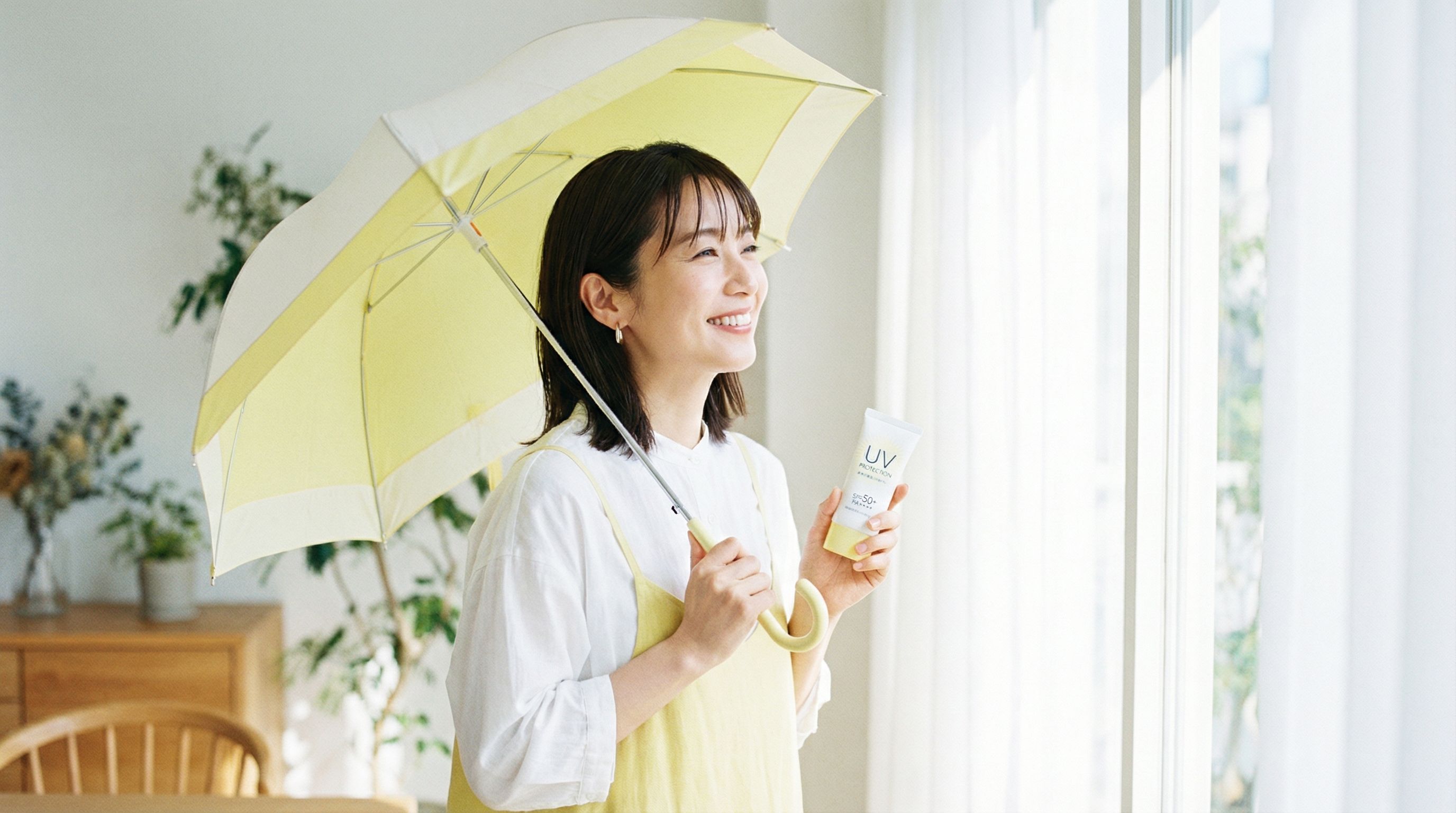 日傘と日焼け止めクリームで紫外線対策